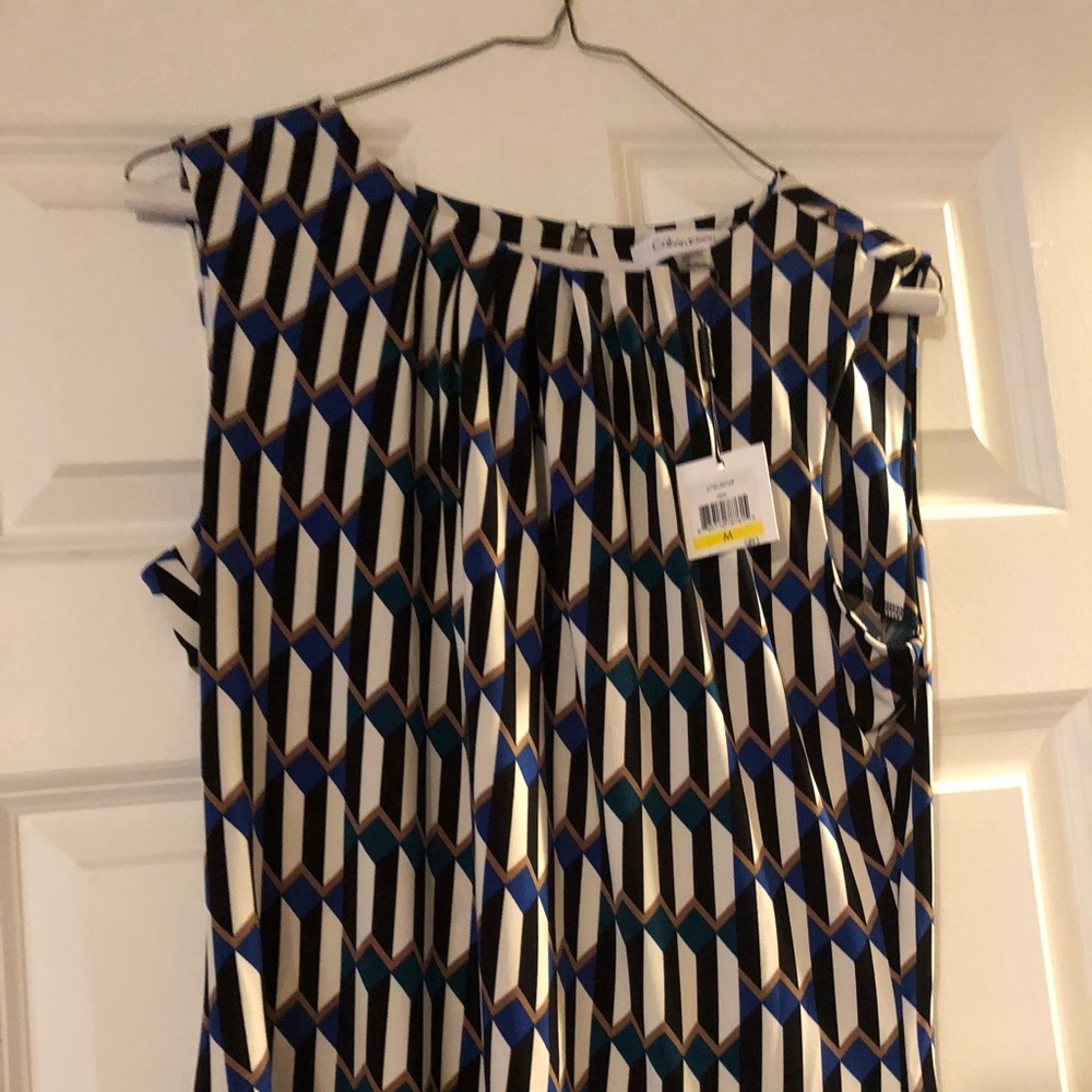 Calvin Klein shirt, new with tags, size M